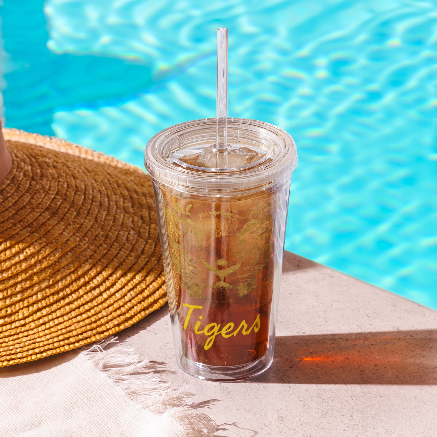 Clear plastic tumbler with Tiger logo in gold