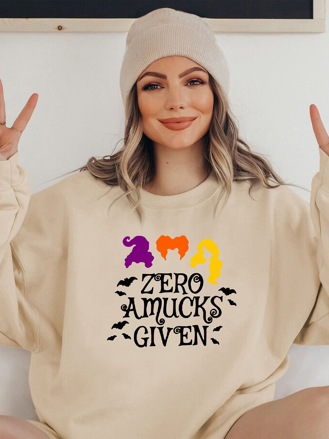 Full Size Round Neck Long Sleeve ZERO AMUCKS GIVEN Graphic Sweatshirt